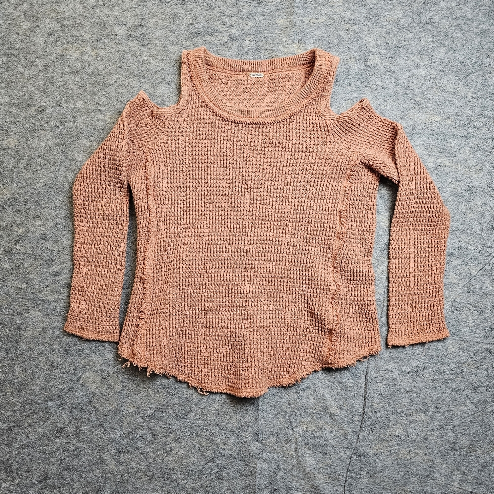 Peachy coral open shoulder free people sweater as seen on selena Gomez